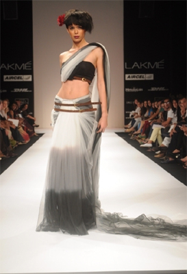Designer presents incomplete collection at LFW