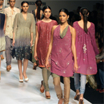 Wendell Rodricks splashes water on the LFW ramp