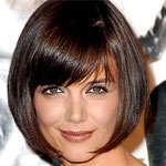 Katie Holmes `moving on` post-split with hubby Tom Cruise