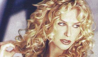 Modern women prefer blonde curls, tan and pencil skirt to look perfect  