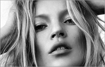 Kate Moss trips over her boots during mid-morning stroll