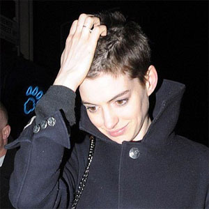 Anne Hathaway happy with short hair