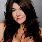 Sexy Imogen Thomas enjoys erotic novel on poolside 