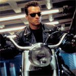 Arnold Schwarzenegger leads the pack as he rides with motorbike gang in LA