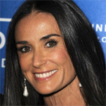 Demi Moore splashes around Mexico beach with younger man