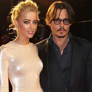 Amber Heard `dumps` Johnny Depp for female French model 	