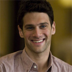 Justin Bartha spotted on a beach with mystery brunette