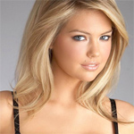 Kate Upton shows off curves in plunging dress on US chat show