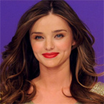 Miranda Kerr gets half-naked for bridal lingerie photoshoot