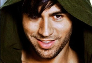 Enrique Iglesias plays with bra onstage during gig
