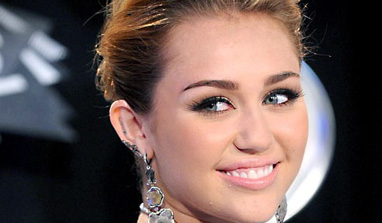 Miley Cyrus flaunts bum cheeks in raciest shoot yet