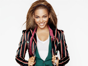 Beyonce strips off to bikini in more H `n` M ads