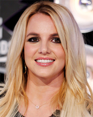 Britney Spears flaunts new bikini body and admits `dieting is tough`