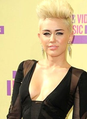 Miley Cyrus' F-bomb blast while sky-diving for first time for Rolling Stone mag